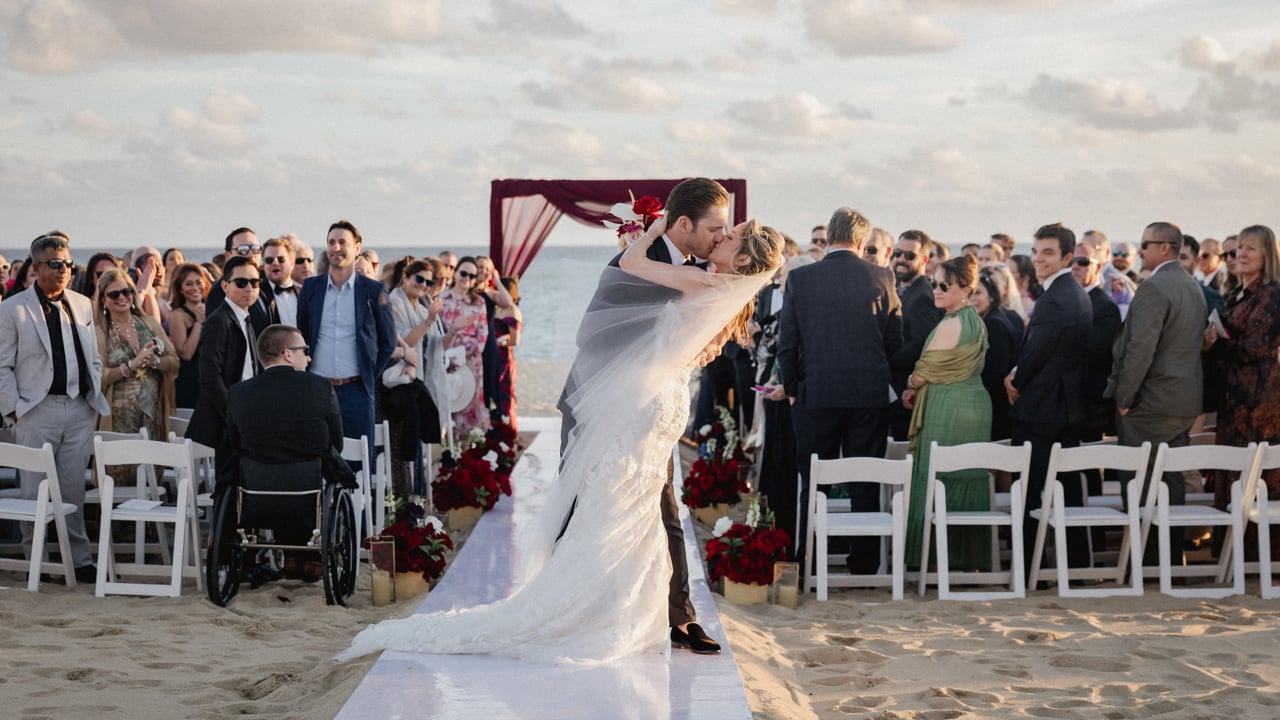 Kendyl and Tate during their beach wedding at Pueblo Bonito Sunset Beach in Los Cabos